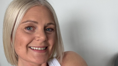 Woman with blonde hair smiling