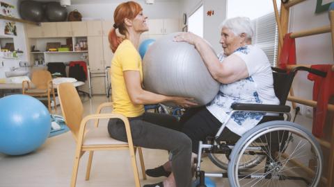 Lady exercising in wheelchair