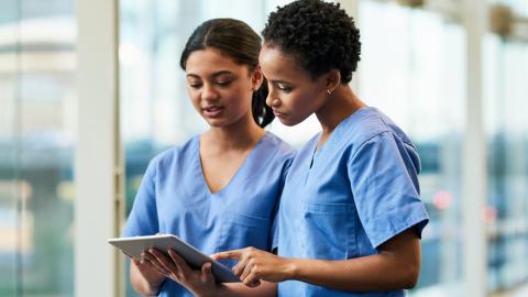 MS nurses on tablet
