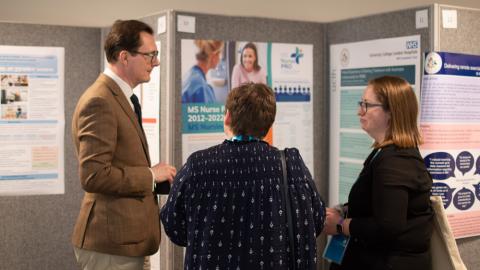 Conference delegates viewing posters
