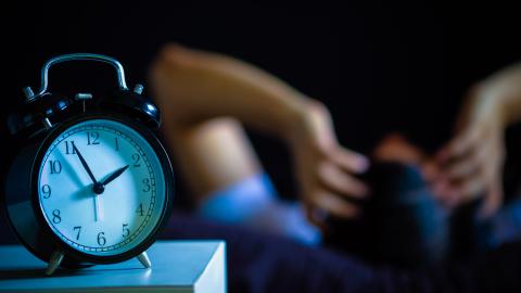 Alarm clock showing 1.55am