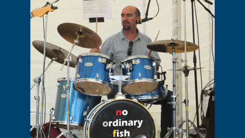Stuart playing the drums