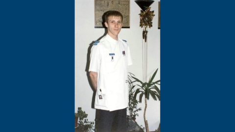 Chris in nurse uniform in the past.