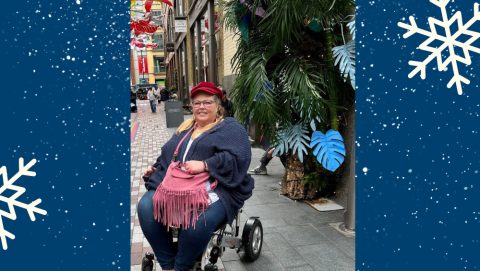 Antoinette in a powered wheelchair 