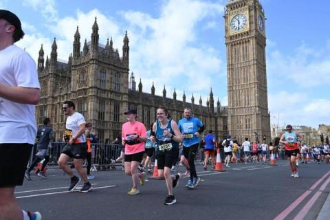 London Landmarks Half Marathon runners in front of the Houses of Parliament and Big Ben
