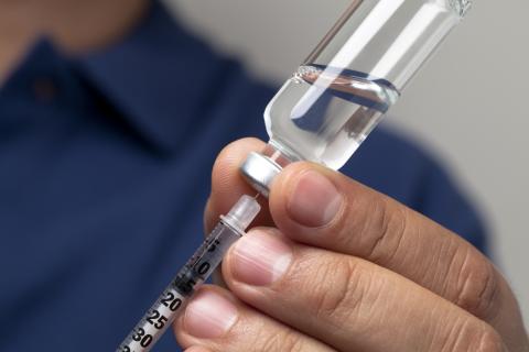Needle and vial
