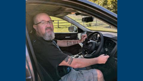 Rob using hand controls in his car