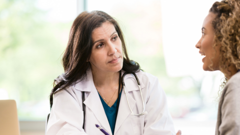 doctor listening to their patient 