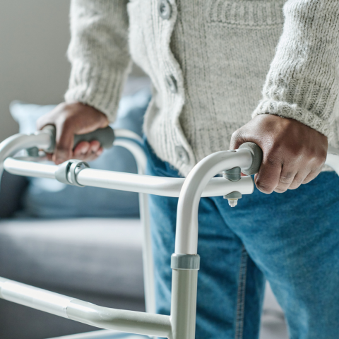 black person using a walking aid
