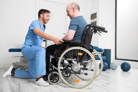 Nurse with patient in a wheelchair