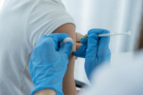 Flu vaccine being injected in arm