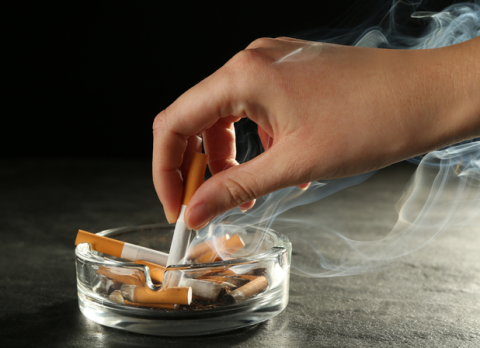 Image of cigarettes smoking in an ashtray
