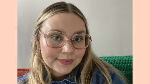 Woman with blonde hair and glasses