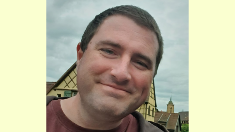 man with short dark hair