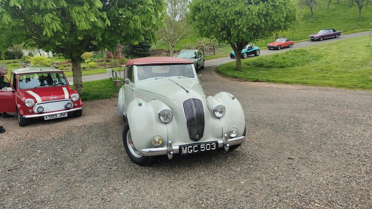 classic mini in red and classic green car
