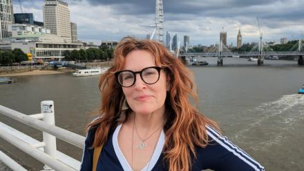 Picture of Helena a woman with red hair standing by the thames