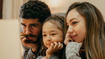 Family getting information on their laptop