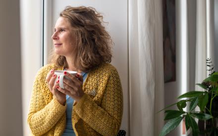 Middle-aged woman drinking tea