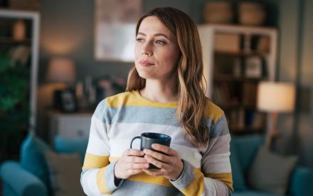 Young woman drinking coffee